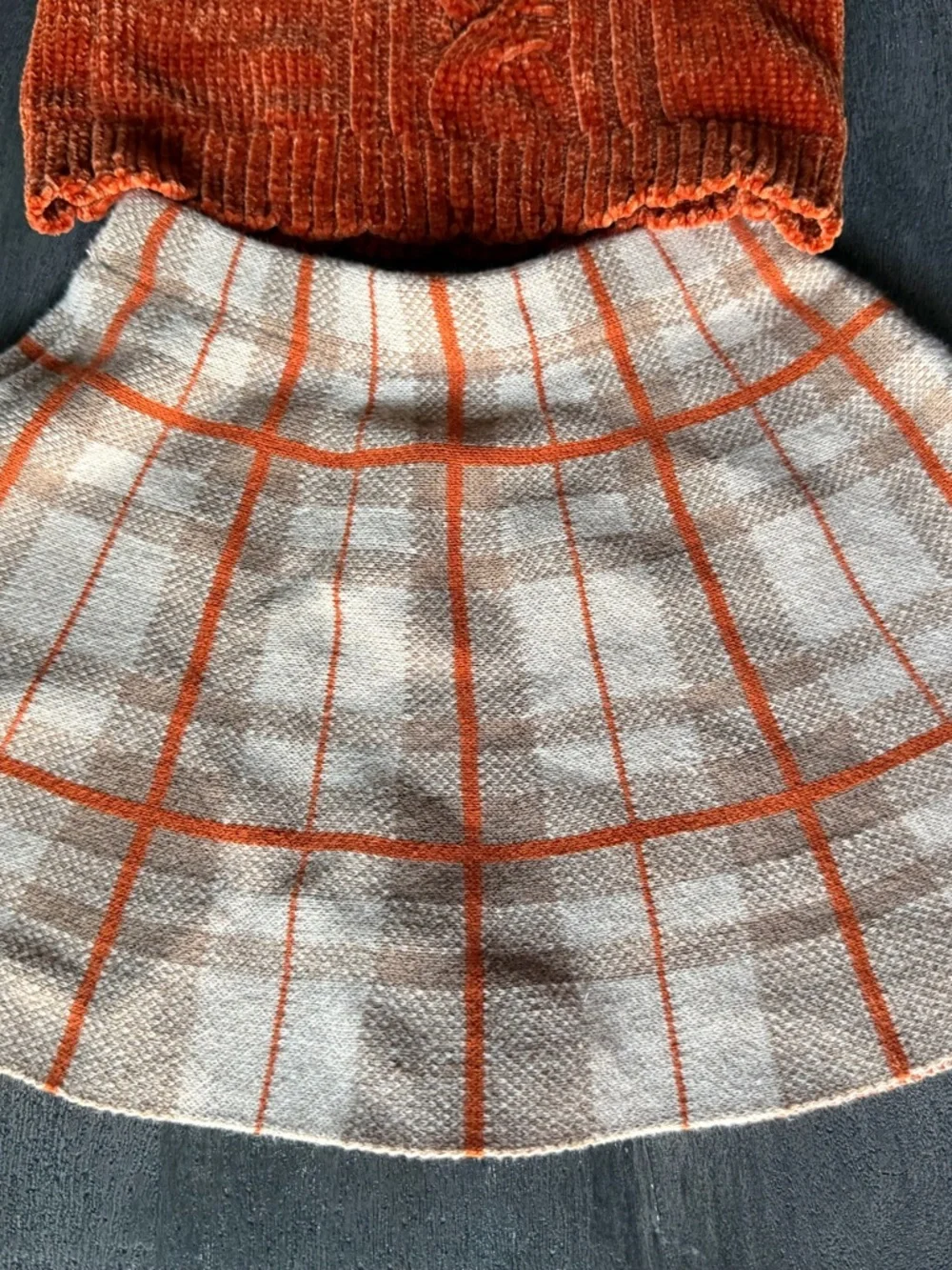 Tommy Bahama Kids Rust Orange Velvet Cable-Knit Sweater and plaid skirt
